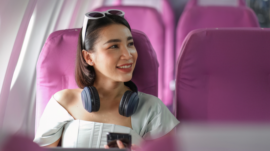 Besvare undersøkelser av kundeopplevelsen av kvinne på flyet